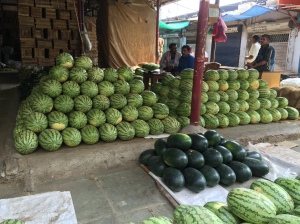 watermelons stacked up in crawford market. bombay, india. may 2015.