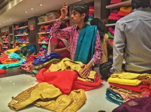 saree shopping is some serious business. bangalore, india. october 2015.