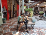 making friends at the pinang peranakan museum. george town, malaysia. april 2016.